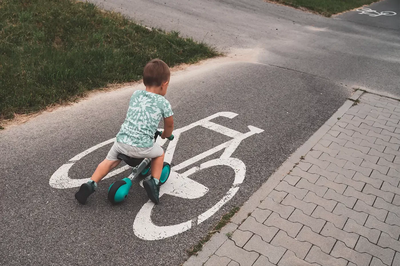 Photo of a young child on a bicycle
