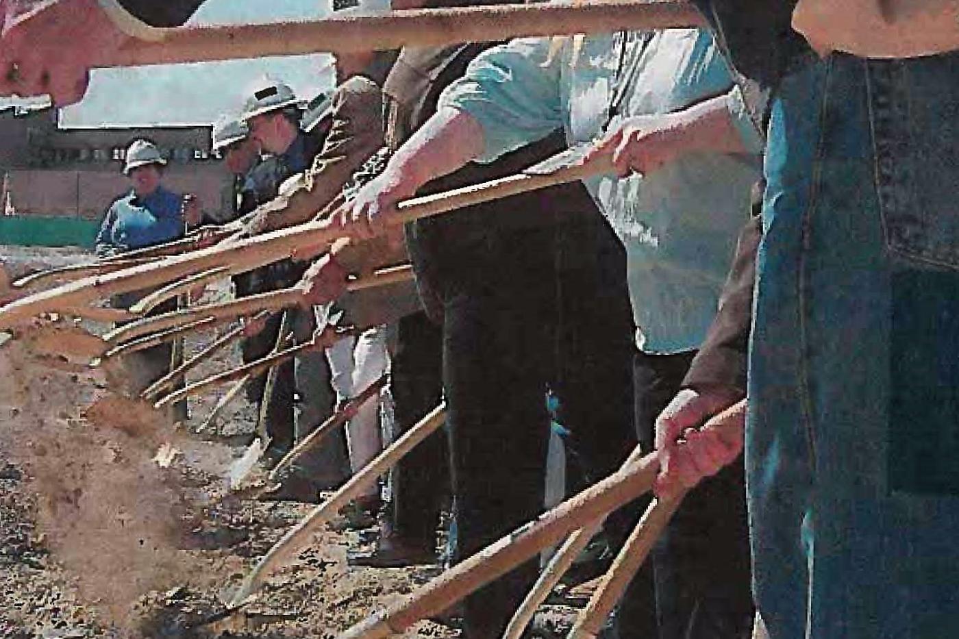 Photo of people breaking ground at a new development